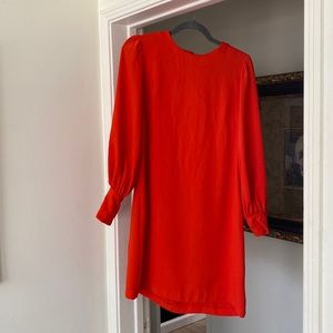 H&M orange red mid length dress with button details.